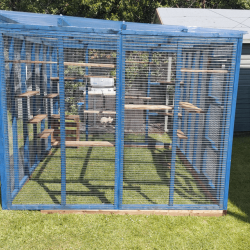 Waterproof Four-Sided Catio cat enclosure painted blue. 